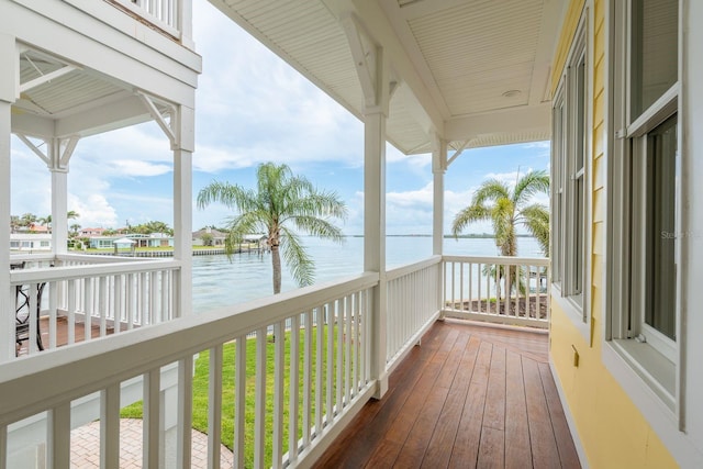 442 Midway Is, Clearwater Beach, FL 33767 - wooden deck featuring a water view