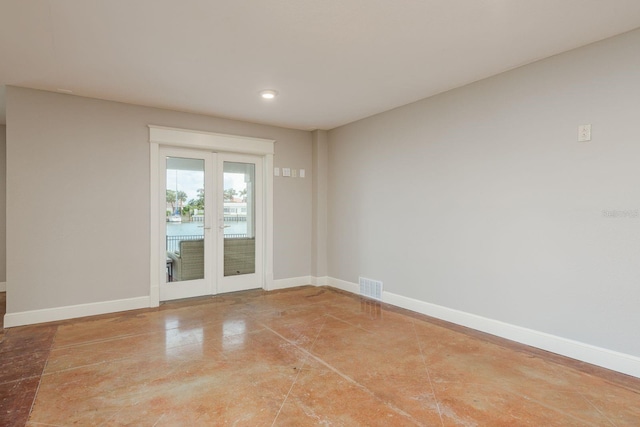 442 Midway Is, Clearwater Beach, FL 33767 - unfurnished room with french doors and recessed lighting