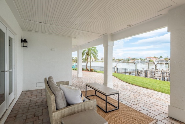 442 Midway Is, Clearwater Beach, FL 33767 - view of patio with a water view