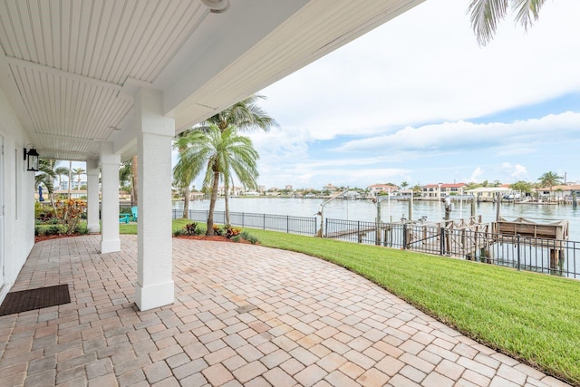 442 Midway Is, Clearwater Beach, FL 33767 - view of patio / terrace featuring a water view, a dock, and boat lift