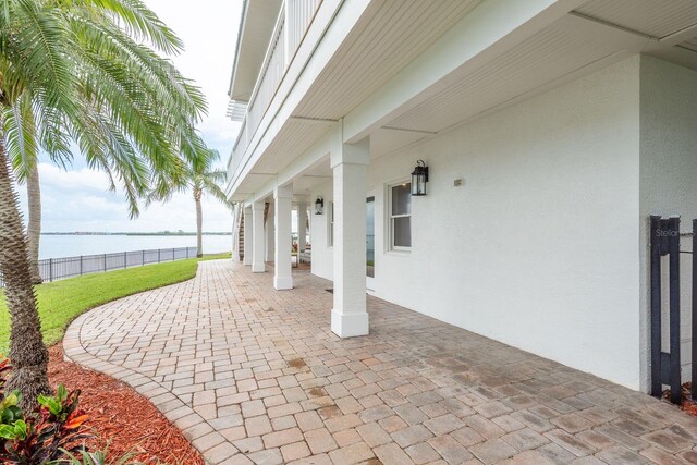 442 Midway Is, Clearwater Beach, FL 33767 - covered porch with a water view