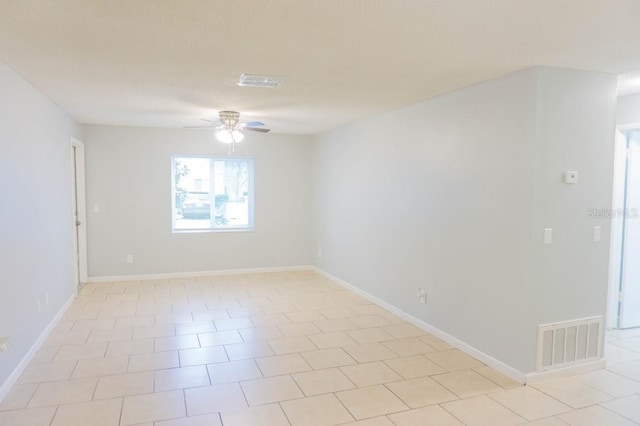 220 Berry Tree Pl Unit 220, Brandon, FL 33510 - spare room featuring a ceiling fan and baseboards
