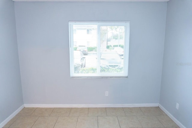 220 Berry Tree Pl Unit 220, Brandon, FL 33510 - spare room with plenty of natural light and light tile patterned flooring