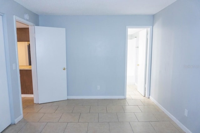 220 Berry Tree Pl Unit 220, Brandon, FL 33510 - unfurnished room with tile patterned flooring and a smoke detector