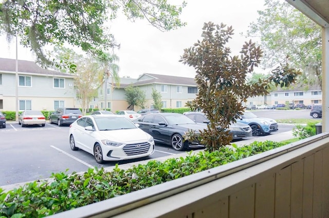 220 Berry Tree Pl Unit 220, Brandon, FL 33510 - uncovered parking lot featuring a residential view