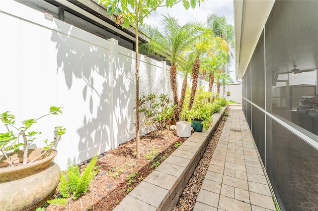 1205 Sweet Gum Dr, Brandon, FL 33511 - view of home's exterior with a sunroom