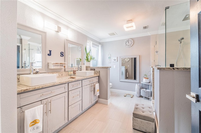 1205 Sweet Gum Dr, Brandon, FL 33511 - bathroom featuring walk in shower, double vanity, ornamental molding, and healthy amount of natural light
