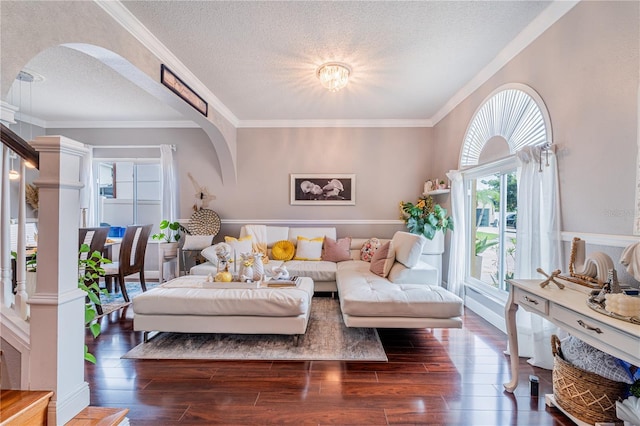 1205 Sweet Gum Dr, Brandon, FL 33511 - living area with arched walkways, a textured ceiling, wood finished floors, and ornamental molding