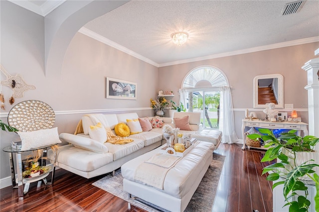 1205 Sweet Gum Dr, Brandon, FL 33511 - living room featuring hardwood / wood-style floors, a textured ceiling, and crown molding