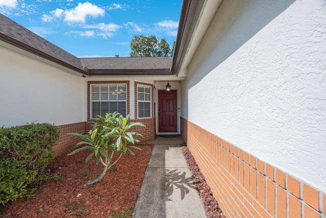 12405 Pathway Ct, Riverview, FL 33569 - view of exterior entry featuring stucco siding