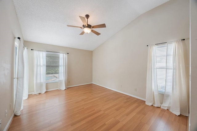 12405 Pathway Ct, Riverview, FL 33569 - spare room featuring ceiling fan, lofted ceiling, and light wood finished floors