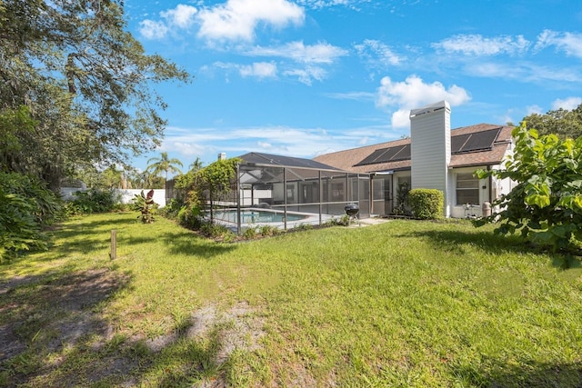 12405 Pathway Ct, Riverview, FL 33569 - view of grassy yard with a lanai