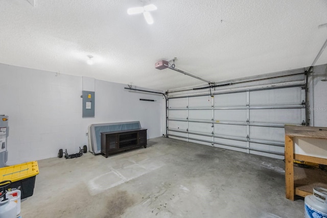 12405 Pathway Ct, Riverview, FL 33569 - garage featuring electric panel and a garage door opener