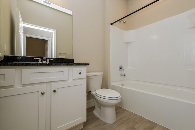 5909 Bibb Ct, North Port, FL 34288 - bathroom with wood finished floors, vanity, and shower / bath combination