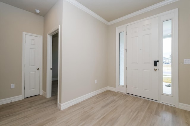 5909 Bibb Ct, North Port, FL 34288 - foyer with light wood-style floors and ornamental molding