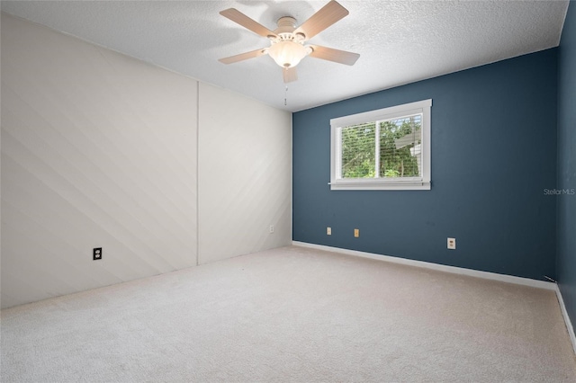 17 Freshwater Dr, Palm Harbor, FL 34684 - carpeted empty room with ceiling fan and a textured ceiling