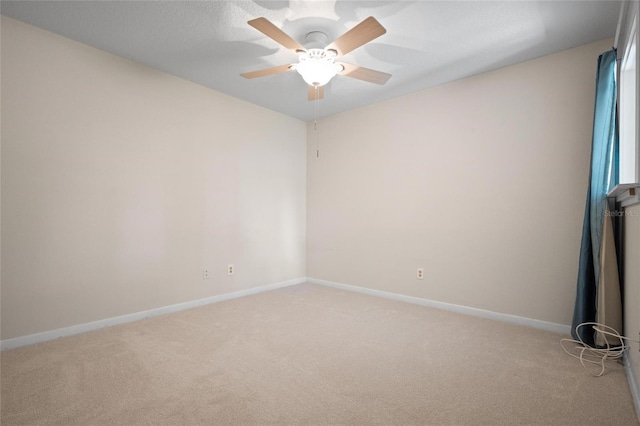 17 Freshwater Dr, Palm Harbor, FL 34684 - empty room featuring light carpet and a ceiling fan
