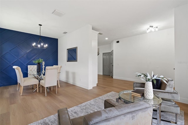 1800 Loch Haven Ct, Trinity, FL 34655 - living area featuring a chandelier and wood finished floors