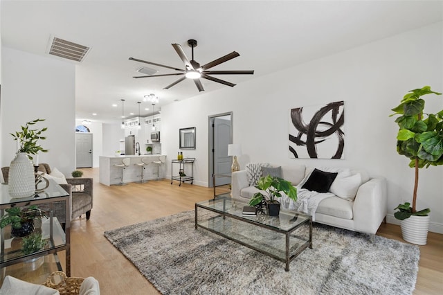 1800 Loch Haven Ct, Trinity, FL 34655 - living area featuring ceiling fan, light wood finished floors, and recessed lighting