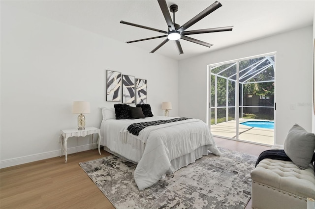 1800 Loch Haven Ct, Trinity, FL 34655 - bedroom featuring a sunroom, access to outside, light wood finished floors, and ceiling fan