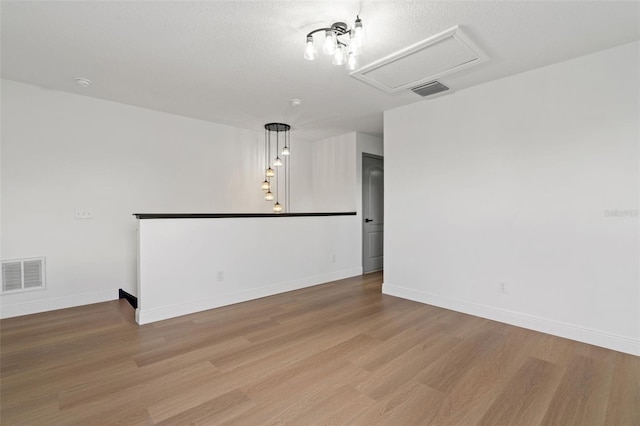 1800 Loch Haven Ct, Trinity, FL 34655 - spare room featuring wood finished floors