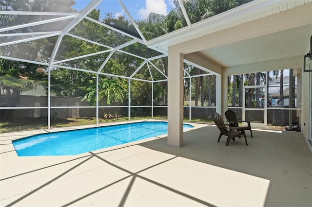 1800 Loch Haven Ct, Trinity, FL 34655 - swimming pool featuring a patio, a fenced backyard, and a lanai