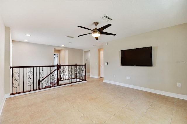 4544 Vermillion Sky Dr, Wesley Chapel, FL 33544 - empty room with ceiling fan, light tile patterned flooring, and recessed lighting