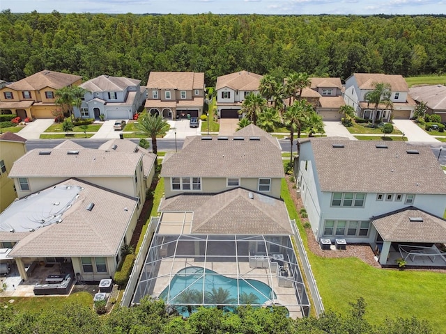 4544 Vermillion Sky Dr, Wesley Chapel, FL 33544 - aerial view of residential area with a forest
