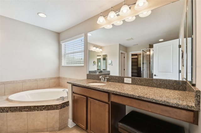 4544 Vermillion Sky Dr, Wesley Chapel, FL 33544 - full bathroom with a bath, vanity, a stall shower, tile patterned floors, and recessed lighting