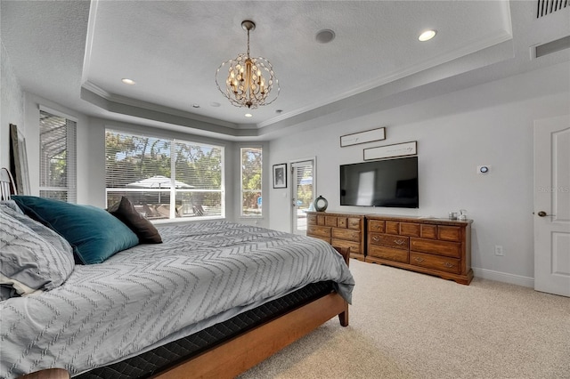 5804 Terncrest Dr, Lithia, FL 33547 - carpeted bedroom with a raised ceiling, multiple windows, a chandelier, ornamental molding, and a textured ceiling