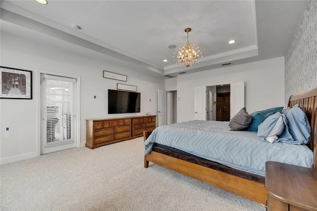 5804 Terncrest Dr, Lithia, FL 33547 - carpeted bedroom featuring a chandelier, a tray ceiling, recessed lighting, access to exterior, and crown molding