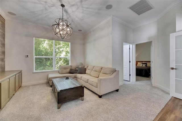 5804 Terncrest Dr, Lithia, FL 33547 - living area featuring a chandelier, ornamental molding, light colored carpet, and light wood finished floors