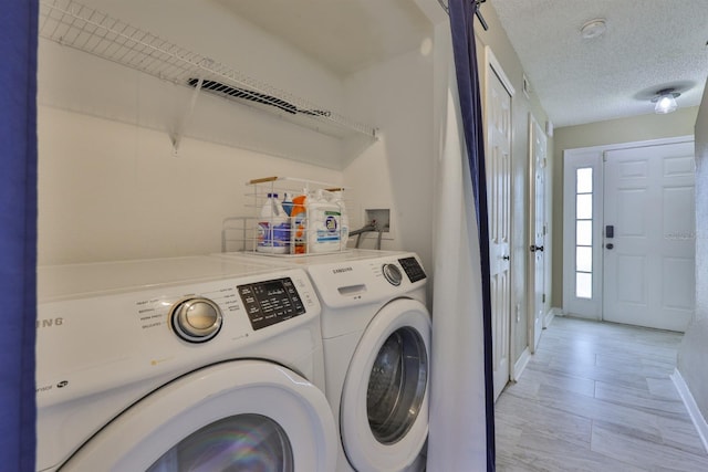 11438 Ivy Flower Loop, Riverview, FL 33578 - washroom with independent washer and dryer and a textured ceiling