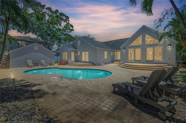 555 21st Ave NE, Saint Petersburg, FL 33704 - swimming pool with entry steps and a patio area