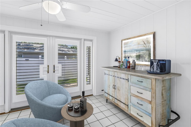 555 21st Ave NE, Saint Petersburg, FL 33704 - living area featuring light tile patterned floors and ceiling fan