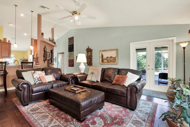 10597 Alvarado Ct, Seminole, FL 33772 - living area featuring lofted ceiling, a ceiling fan, french doors, and wood-type flooring