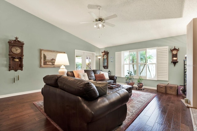 10597 Alvarado Ct, Seminole, FL 33772 - living area featuring a ceiling fan, lofted ceiling, dark wood-type flooring, and a textured ceiling