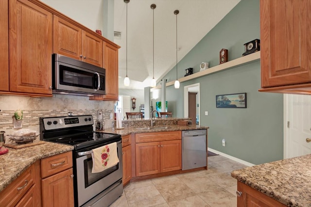 10597 Alvarado Ct, Seminole, FL 33772 - kitchen with appliances with stainless steel finishes, tasteful backsplash, brown cabinets, light stone countertops, and high vaulted ceiling