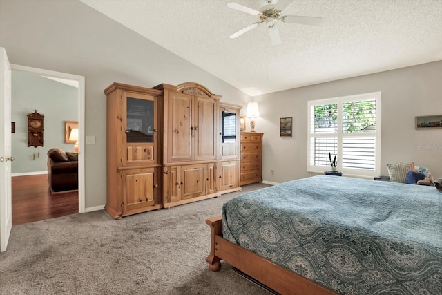 10597 Alvarado Ct, Seminole, FL 33772 - bedroom with lofted ceiling, a textured ceiling, light carpet, and a ceiling fan