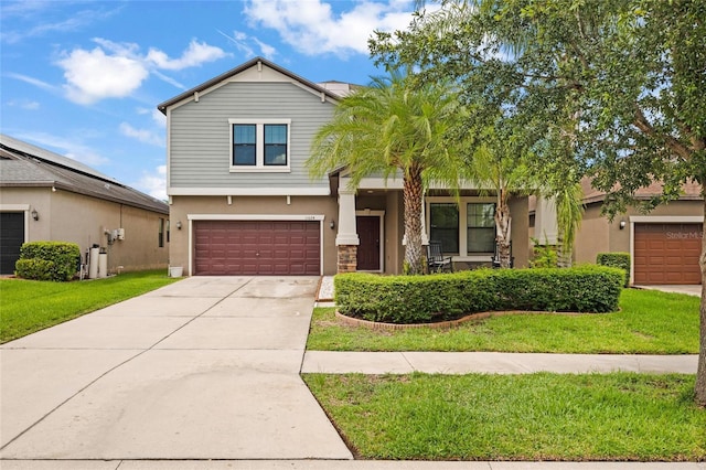 11024 Purple Martin Blvd, Riverview, FL 33579 - view of front of home featuring a garage, a front lawn, stucco siding, concrete driveway, and a porch