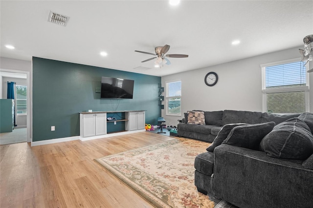 11024 Purple Martin Blvd, Riverview, FL 33579 - living room featuring light wood finished floors, recessed lighting, and ceiling fan