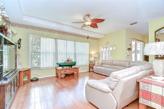 2226 N Creek Ct, Sun City Center, FL 33573 - living area with light wood-type flooring and ceiling fan