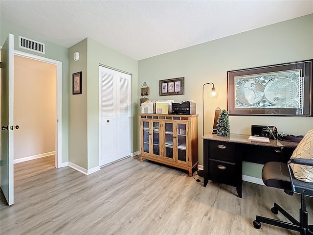 1207 Pine Ridge Cir W Unit H2, Tarpon Springs, FL 34688 - home office featuring light wood finished floors