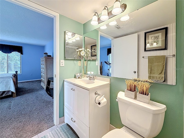 1207 Pine Ridge Cir W Unit H2, Tarpon Springs, FL 34688 - bathroom with vanity and connected bathroom
