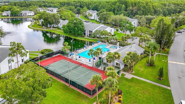 1207 Pine Ridge Cir W Unit H2, Tarpon Springs, FL 34688 - drone / aerial view of a large body of water and a pool area