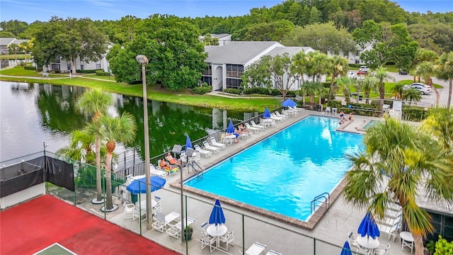 1207 Pine Ridge Cir W Unit H2, Tarpon Springs, FL 34688 - community pool featuring a water view