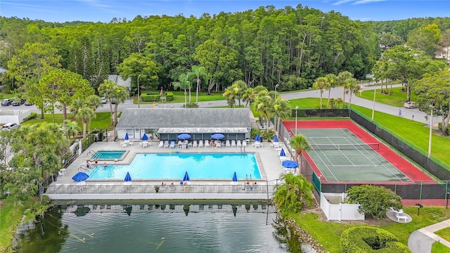 1207 Pine Ridge Cir W Unit H2, Tarpon Springs, FL 34688 - bird's eye view of a pool and a nearby body of water