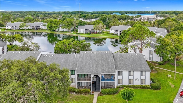 1207 Pine Ridge Cir W Unit H2, Tarpon Springs, FL 34688 - aerial perspective of suburban area featuring a large body of water