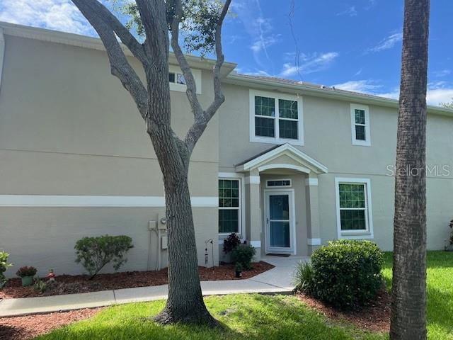 3665 Country Pointe Pl, Palm Harbor, FL 34684 - view of front facade featuring stucco siding