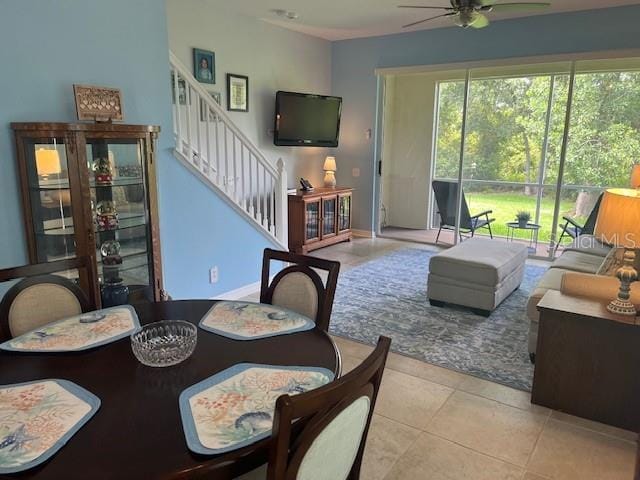 3665 Country Pointe Pl, Palm Harbor, FL 34684 - living room with a ceiling fan, stairway, and light tile patterned flooring